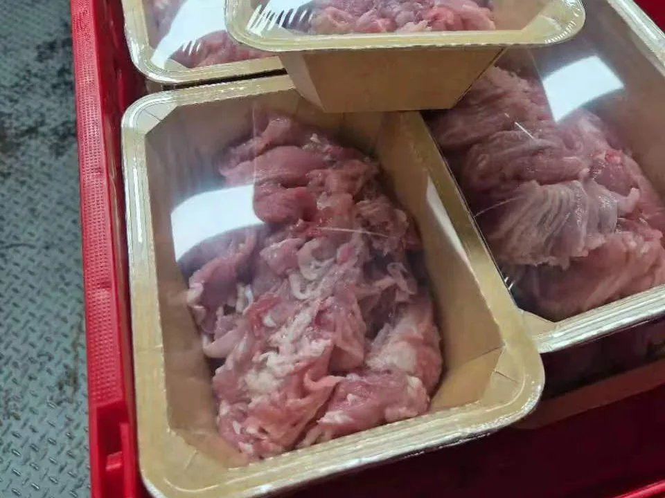 Fresh meat sealed in paper-based trays